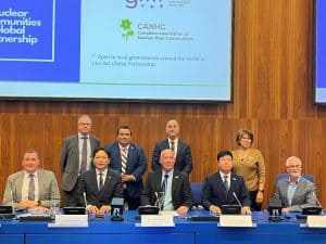 Group photo of diverse representatives at the ARMA community event during the IAEA conference, promoting global nuclear safety partnerships and new member countries.