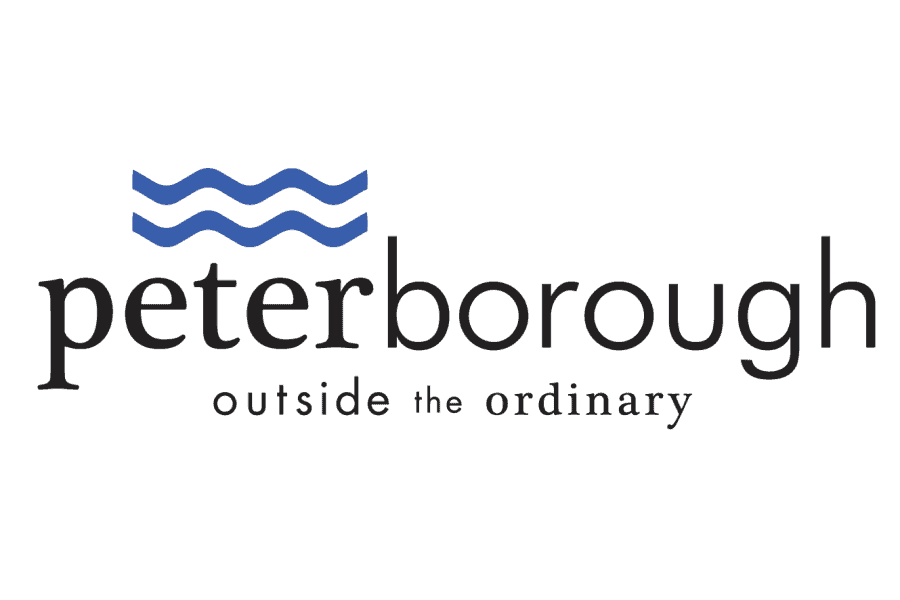 Scenic view of Peterborough, Ontario, featuring water waves and cityscape, highlighting the outdoor environment and community in the City of Peterborough, Ontario, Canada.