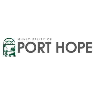 Logo of the Municipality of Port Hope, Ontario, Canada, featuring a green emblem with a bridge, trees, and a river, representing the local government and community.